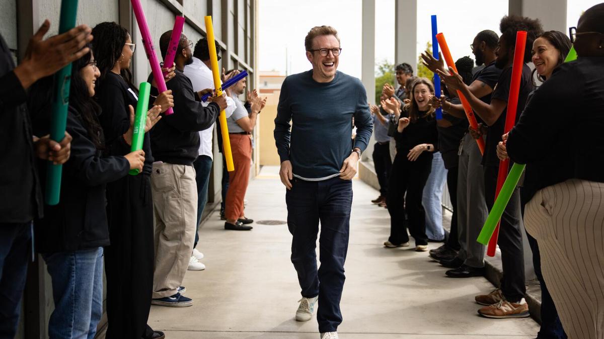 INGLEWOOD, CA - MAY 26, 2026: Students and faculty cheer as Daniel Harding, Los Angeles Philharmonic's new music director, arrives at The Judith and Thomas L. Beckmen YOLA Center on Tuesday, May 26, 2026, in Inglewood, CA. The British-born conductor was named the orchestra's 12th music director of the Los Angeles Philharmonic and will begin his begin a six-year contract in the fall of 2027. (Kayla Bartkowski / Los Angeles Times)