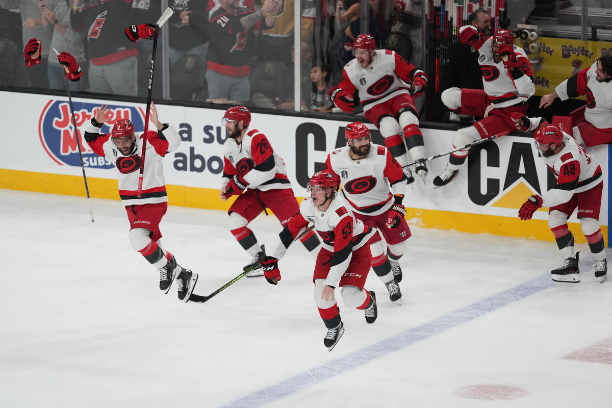 Jun 14, 2026; Las Vegas, Nevada, USA; Carolina Hurricanes celebrate the win against the Vegas Golden Knights in game six of the 2026 Stanley Cup Final at T-Mobile Arena. Mandatory Credit: Lucas Peltier-Imagn Images