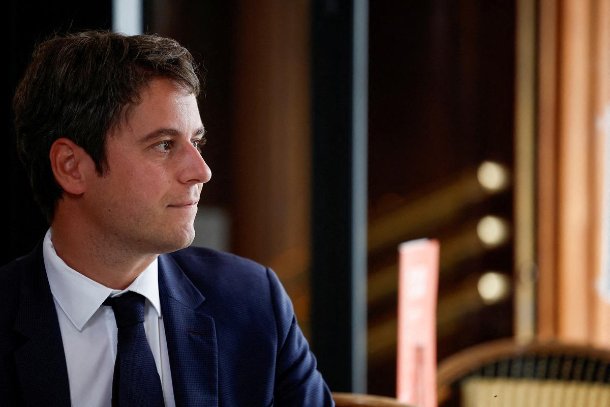 FILE PHOTO: French Prime Minister Gabriel Attal campaigns before the second round of the early French parliamentary elections, in Paris, France, July 5, 2024. REUTERS/Benoit Tessier/File Photo