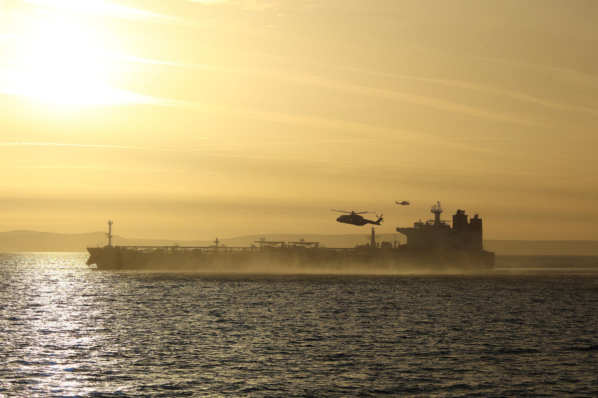 UK Royal Marine Commandos take part in a maritime interdiction operation on the vessel SMYRTOS off the south coast of England, June 14, 2026. The boarding, carried out with National Crime Agency officers, was part of a UK operation targeting vessels suspected of attempting to evade sanctions linked to Russia’s war in Ukraine, authorities said. UK MOD Crown/LPhot Hutchins/Handout via REUTERS