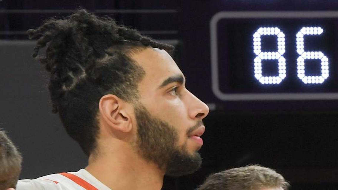  Clemson center Christian Reeves (14), left, guard Jake Heidbreder (3), forward Ian Schieffelin (4), forward Chauncey Wiggins (7) joins teammates after beating Syracuse 86-75 at Littlejohn Coliseum in Clemson, S.C Wednesday, January 22, 2025. | Ken Ruinard - The Greenville News / USA TODAY NETWORK via Imagn Images 