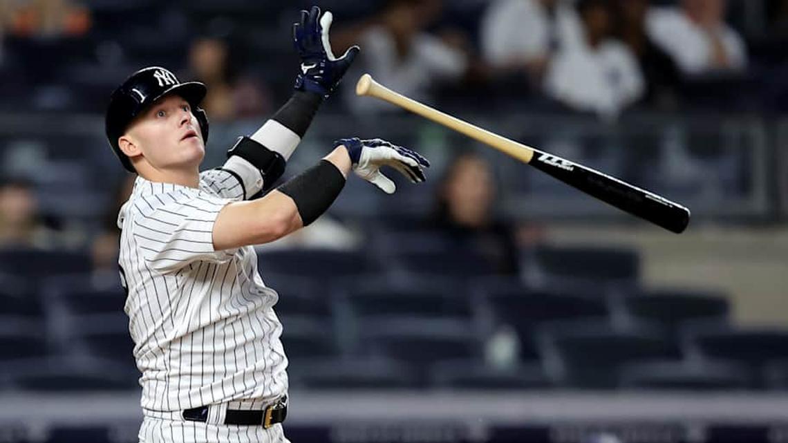  New York Yankees designated hitter Josh Donaldson (28) tosses his bat after hitting a game winning grand slam home run against the Tampa Bay Rays during the tenth inning at Yankee Stadium. | Brad Penner-Imagn Images 