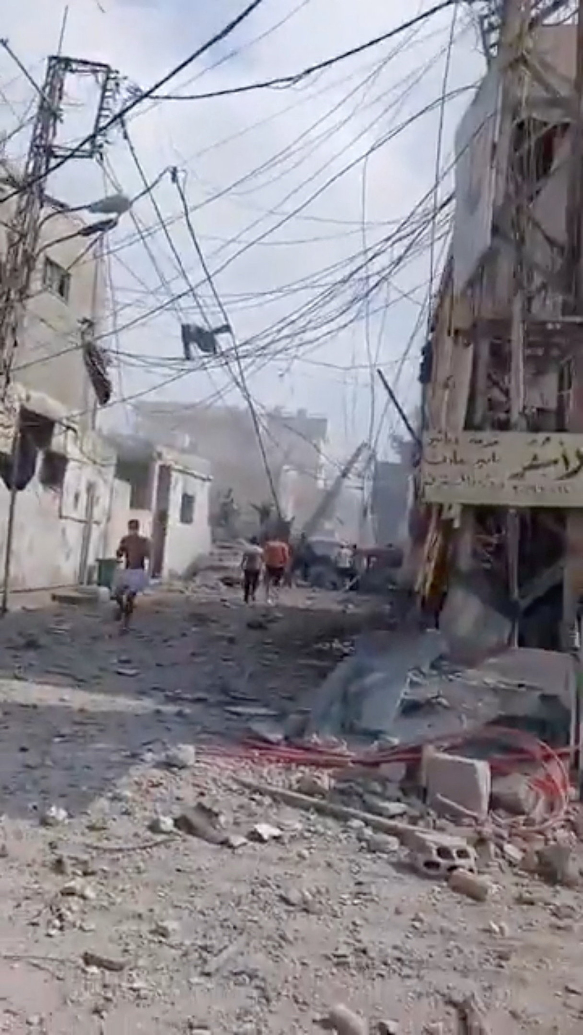 People inspect the damage in the aftermath of an Israeli strike, in Tyre, Lebanon, June 9, 2026, in this screen grab taken from a social media video. Social Media/via REUTERS
