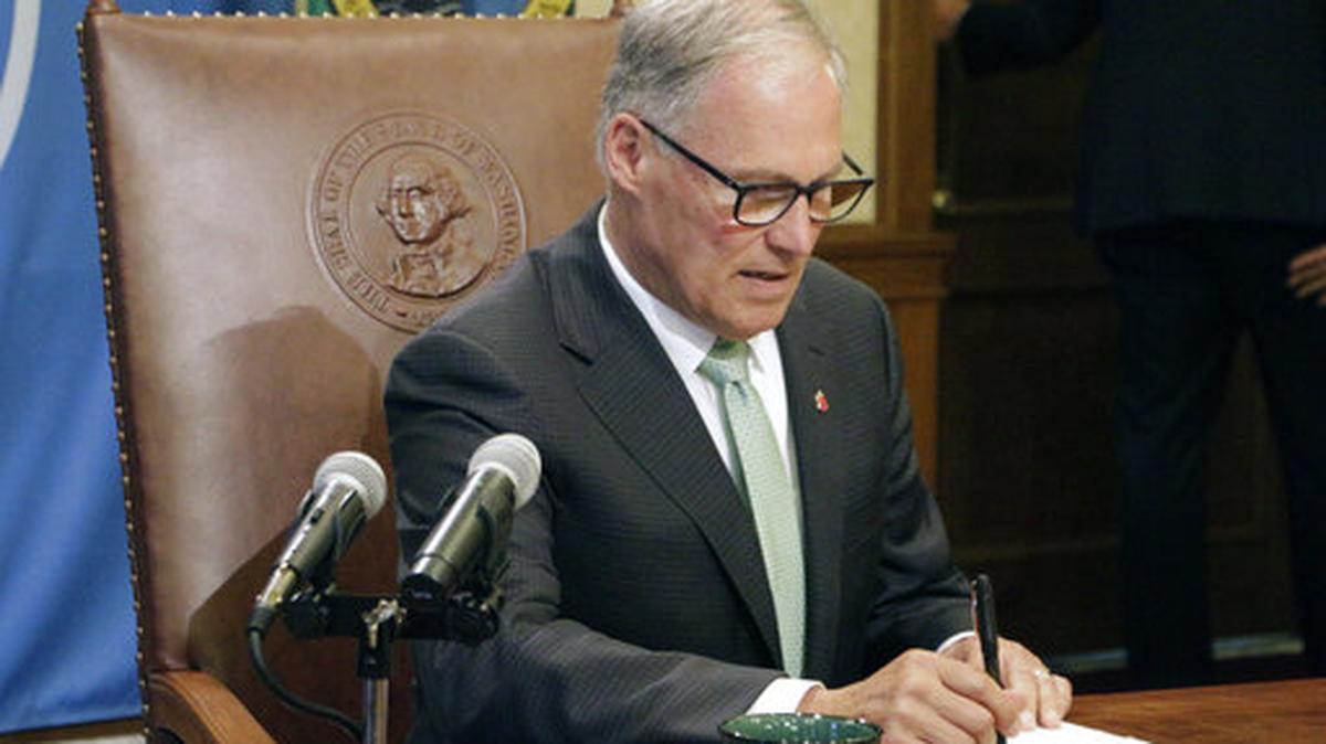 The measure that Washington Gov. Jay Inslee signed into law Thursday, requires landlords to give tenants who are behind on their rent at least 14 days to pay up, rather than three.