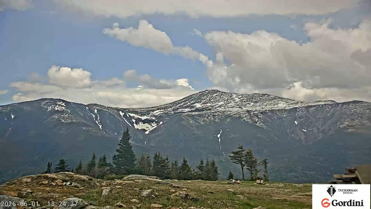  The new snow is hanging on at the highest points of Mt. Washington. Photo taken from the Wildcat webcam, June 1, 2026.
