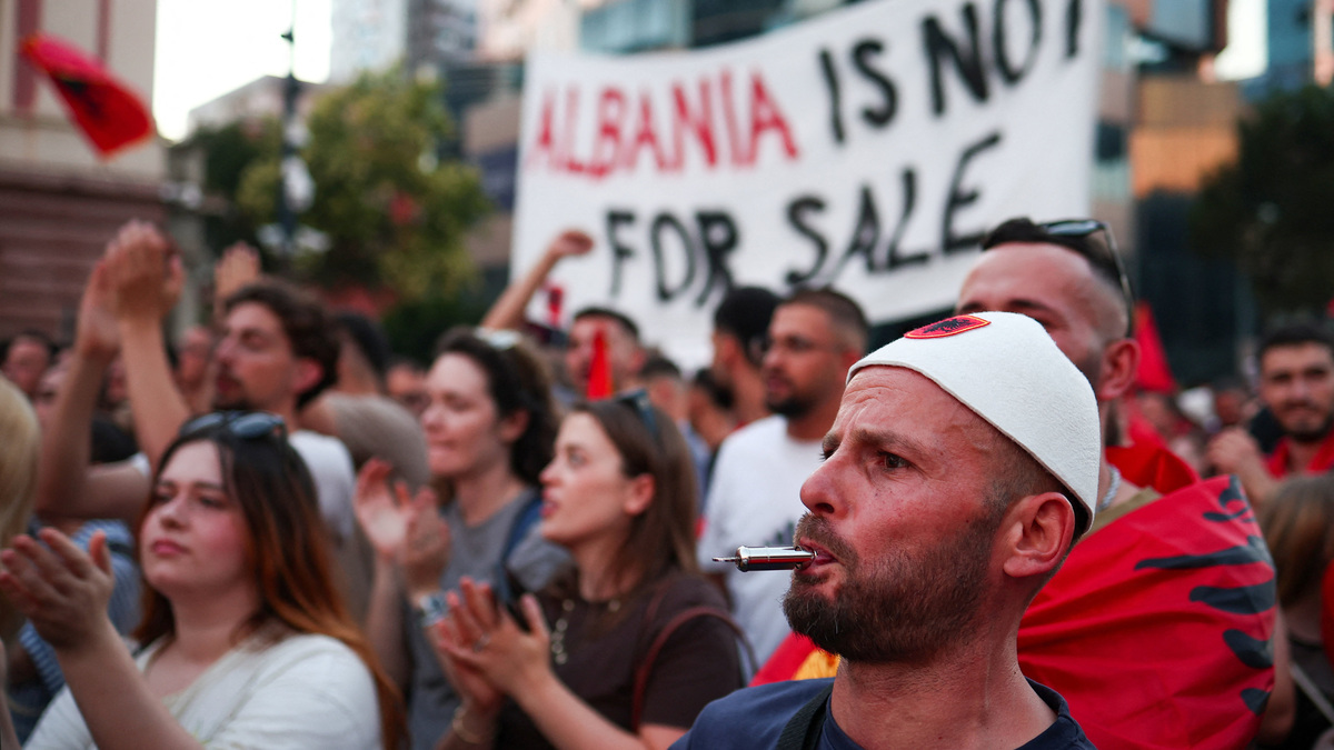 People take part in a protest against a luxury resort, a plan by a company linked to U.S. President Donald Trump's son-in-law, Jared Kushner, on an environmentally sensitive part of the Adriatic coast, in Tirana, Albania, June 10, 2026. REUTERS/Florion Goga