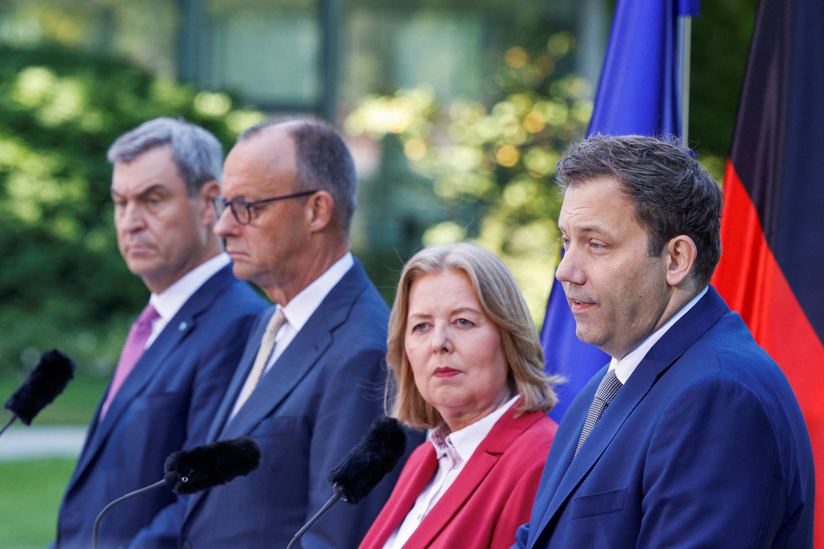 German Finance Minister and co-leader of the Social Democratic Party (SPD) Lars Klingbeil, Labour and Social Affairs Minister and SPD co-leader Baerbel Bas, Chancellor and leader of the Christian Democratic Union (CDU) Friedrich Merz and Christian Social Union (CSU) leader and Bavarian State Premier Markus Soeder attend a press conference following a government coalition board meeting at the Chancellery, in Berlin, Germany, July 2, 2026. REUTERS/Axel Schmidt
