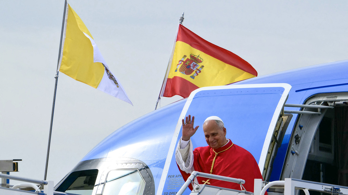 Pope Leo XIV waves upon his arrival at the Adolfo Suarez Madrid/Barajas International Airport, Saturday, June 6, 2026, on the occasion of his Apostolic journey to Spain. Pope Leo XIV is visiting Spain June 6-12 with stops in Madrid, Barcelona, and the Canary Islands. (Stefano Rellandini/AFP/Getty Images/TNS)