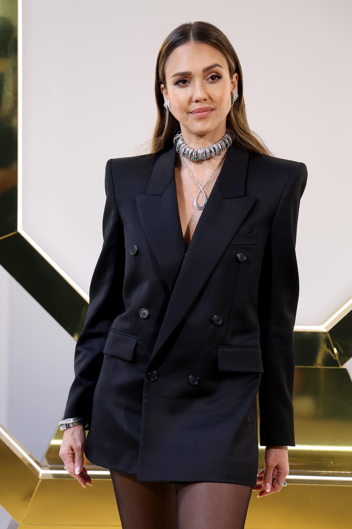 2024 Jessica donned a double-breasted coat dress during Milan Fashion Week. Vittorio Zunino Celotto/Getty Images