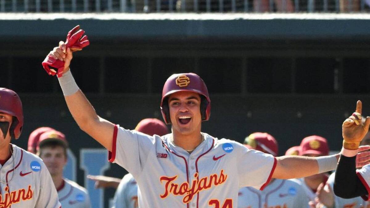  Jun 5, 2026; Chapel Hill, NC, USA; USC infielder Dean Carpentier (6) and teammates celebrate his grand slam against the North Carolina Tar Heels in the sixth inning at Boshamer Stadium. | Zachary Taft-Imagn Images 