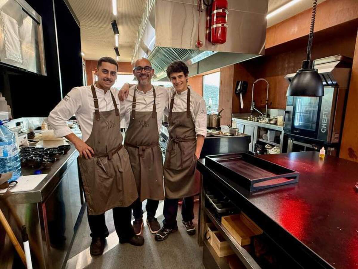  Chef Rafa Centeno with his sons, Guillermo and Diego, in the kitchen of Michelin-starred Vértigo Restaurante. Photo credit: Margot Black 