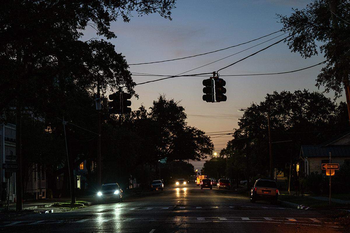 Damaged power lines over a darkened street in Galveston, Texas, after Hurricane Beryl hit the Texas coast on Monday. Power outages from the storm affected as many as 2.7 million customers across the state, mostly in and around Houston.