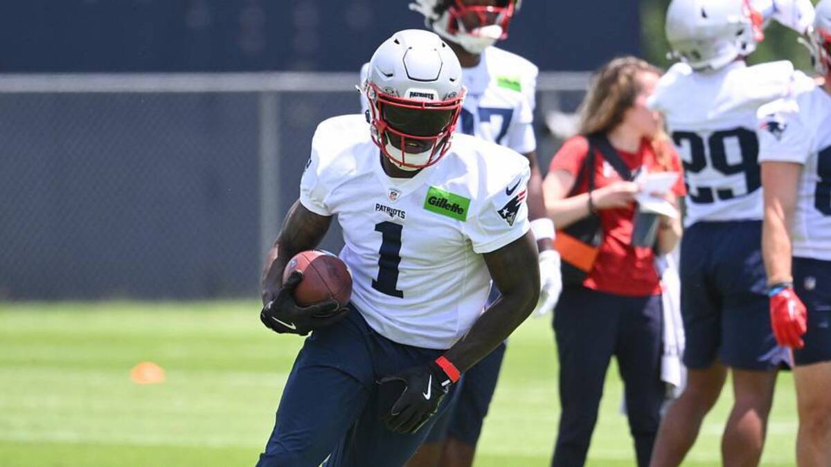  Jun 2, 2026; Foxborough, MA, USA; New England Patriots wide receiver A.J. Brown (1) runs after making a catch during the team's OTA at Gillette Stadium. Mandatory Credit: Eric Canha-Imagn Images | Eric Canha-Imagn Images 