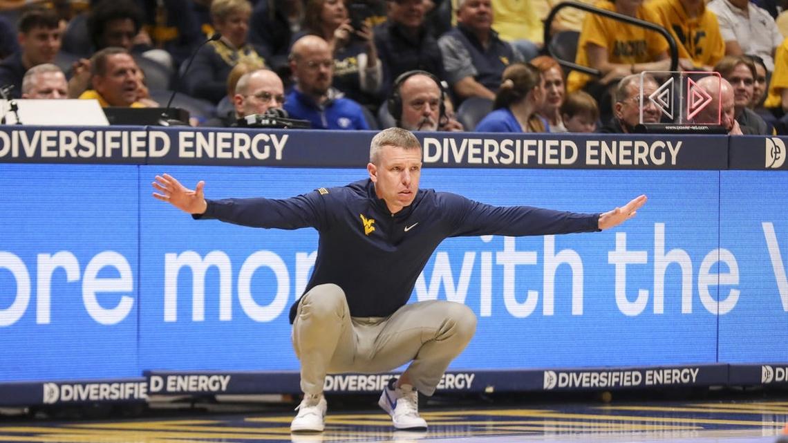 West Virginia cruises past Creighton to reach Crown title game 