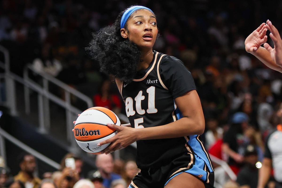  Atlanta Dream forward Angel Reese handles the ball during her team's game against the Las Vegas Aces at State Farm Arena on May 17, 2026. Brett Davis-Imagn Images