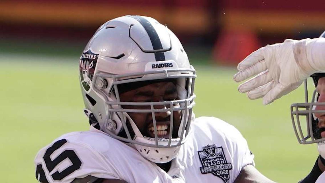  Oct 11, 2020; Kansas City, Missouri, USA; Las Vegas Raiders defensive end Maxx Crosby (98) and defensive end Datone Jones (95) celebrate after a sack in the fourth quarter against the Kansas City Chiefs at Arrowhead Stadium. The Raiders defeated the Chiefs 40-32. Mandatory Credit: Kirby Lee-Imagn Images | Kirby Lee-Imagn Images 