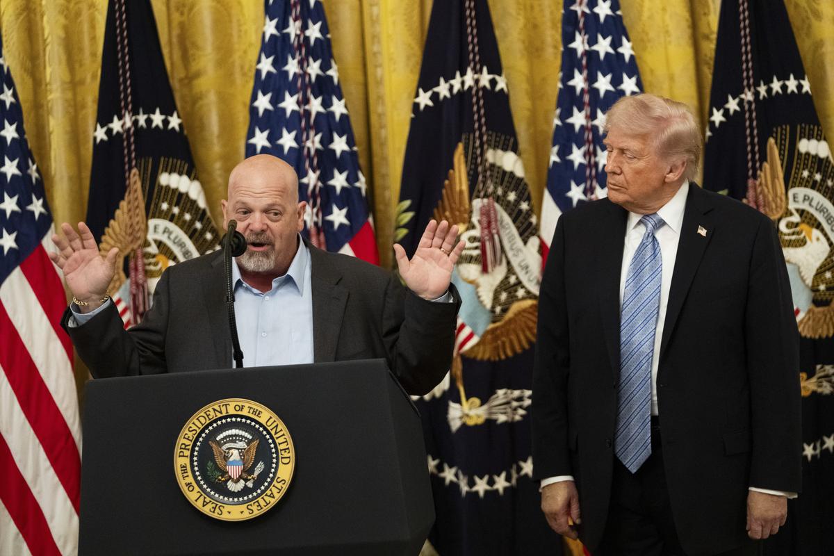 President Donald Trump listens as Rick Harrison, star of the reality tv series "Pawn Stars," speaks during an event for "Small Business Week" in the East Room of the White House in Washington, on Monday, May 4, 2026. (Allison Robbert/The New York Times)