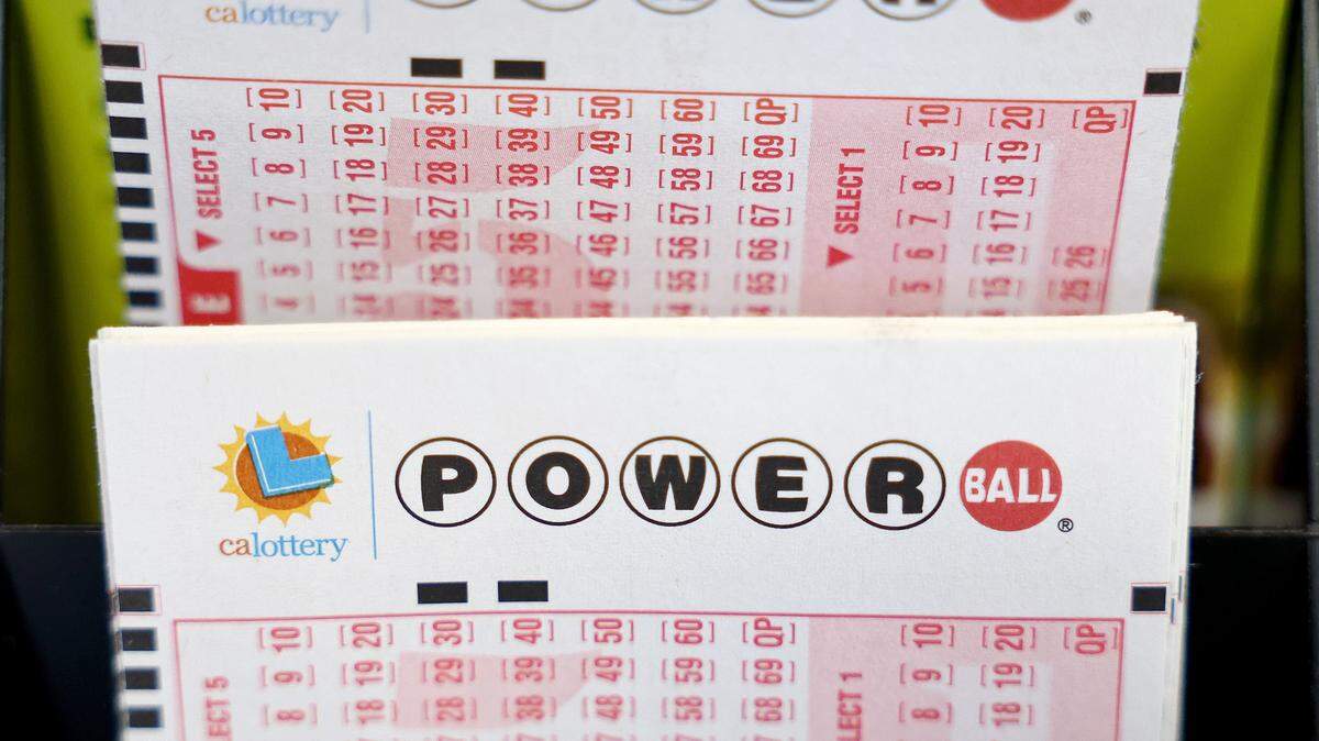Powerball play slips are displayed in a convenience store on July 18, 2023, in Los Angeles.