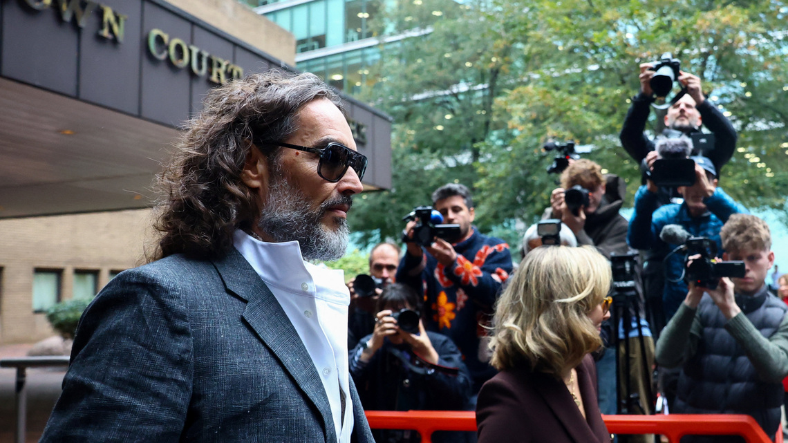 'Wild-eyed' comedian Russell Brand tried to drag me into toilets, woman tells UK court 