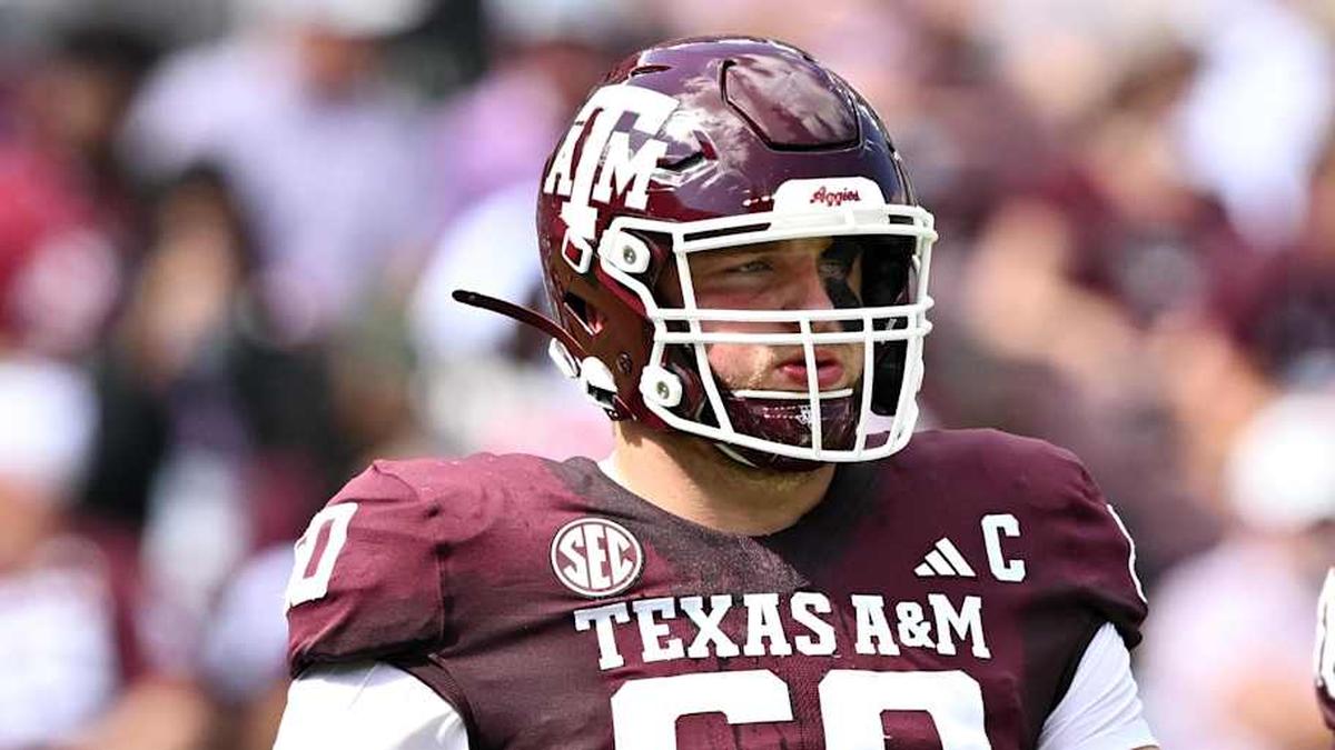  Oct 5, 2024; College Station, Texas, USA; Texas A&M Aggies offensive lineman Trey Zuhn III (60) walks on the field in the first half against the Missouri Tigers at Kyle Field. Mandatory Credit: Maria Lysaker-Imagn Images. | Maria Lysaker-Imagn Images 
