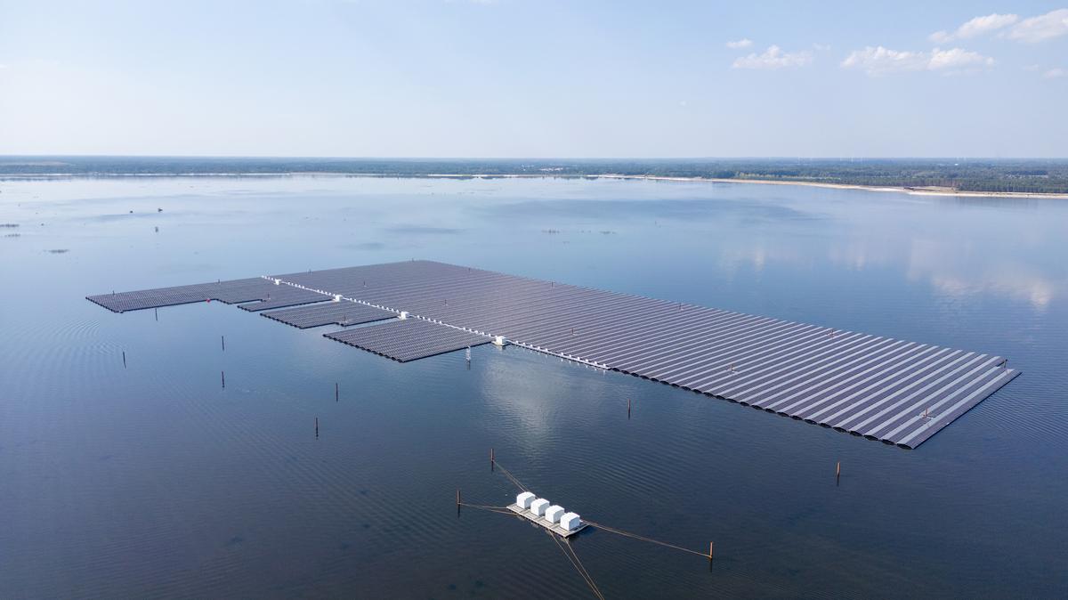 An aerial view shows the floating photovoltaic solar energy farm during construction on the Cottbuser Ostsee lake near Cottbus, eastern Germany on Aug. 29, 2024. Cottbuser Ostsee is an artificial lake and was previously an opencast coal mine. LEAG, which operates the region's still existing coal mines and coal-fired power plants, is investing heavily in renewable energy sources, including solar. The floating photovoltaic farm on the Cottbuser Ostsee is to be the biggest in Germany with a capacity to supply electricity to over 8000 households. (Ralf Hirschberger/AFP/Getty Images/TNS)