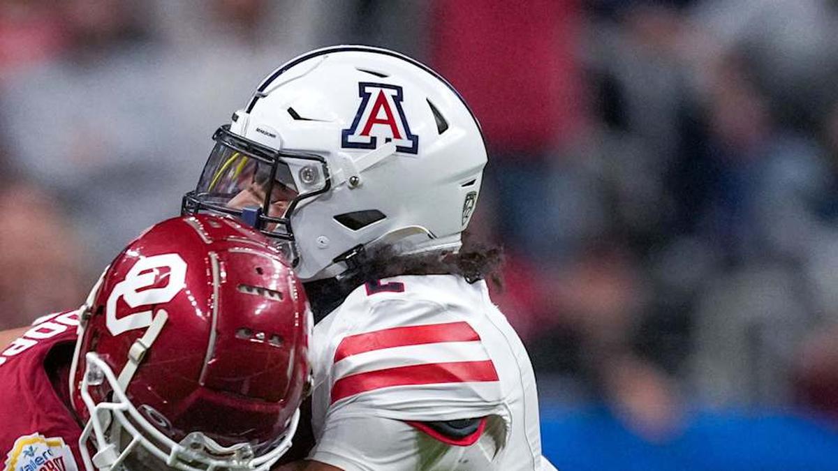  Dec 28, 2023; San Antonio, TX, USA; Arizona Wildcats cornerback Treydan Stukes (2) brings down Oklahoma Sooners wide receiver Drake Stoops (12) in the first half at Alamodome. Mandatory Credit: Daniel Dunn-Imagn Images | Daniel Dunn-Imagn Images 