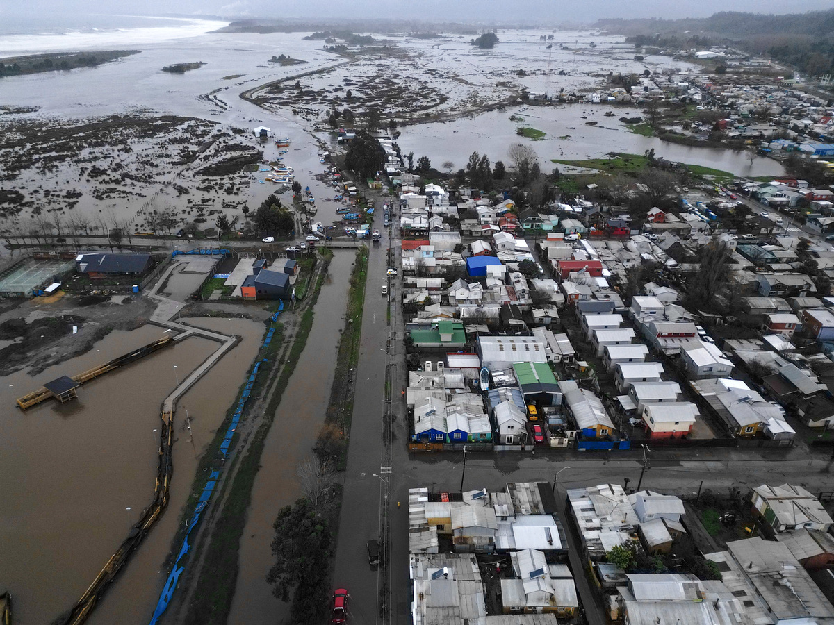A drone view of a flooded area caused by the rain during a weather front that led the Chilean authorities to declare a preventive state of emergency at the start of the week, in Arauco, Chile July 16, 2026. REUTERS/Juan Gonzalez