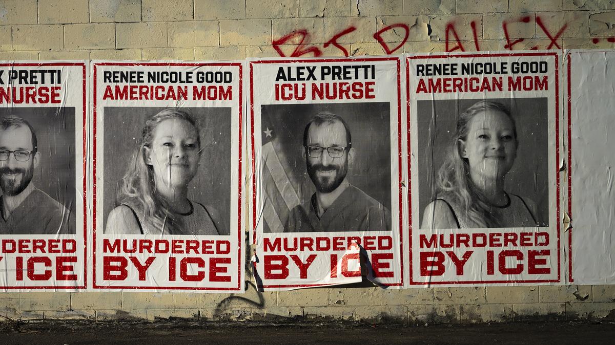 Signs memorializing Renee Good and Alex Pretti are seen pasted to the wall of a building on Feb. 12, 2026, in Minneapolis. Good and Pretti were both shot and killed by federal immigration agents last month. White House "Border Czar" Tom Homan announced today that the federal immigration enforcement surge in the state would conclude. (Stephen Maturen/Getty Images/TNS)