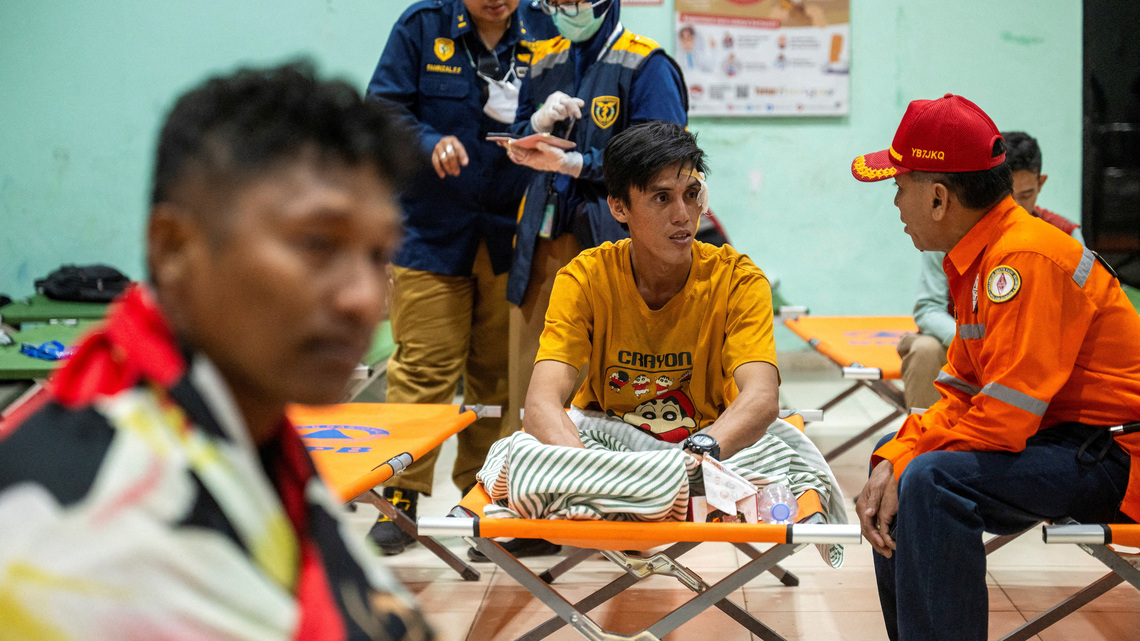 Indonesia recovers three bodies as effort begins to right capsized ship 