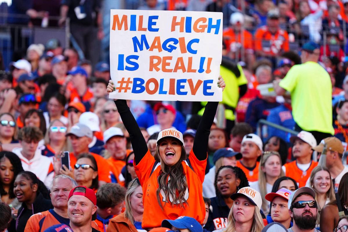  A Denver Broncos fan holds a sign during a game against the Kansas City Chiefs at Empower Field at Mile High. Ron Chenoy-Imagn Images