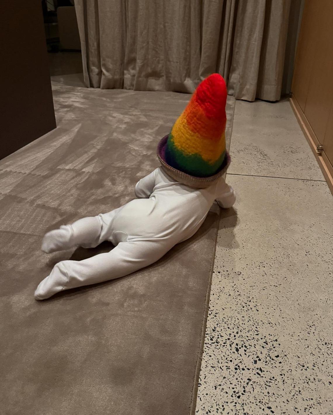Mama's Boy "I love being your mommy Jack Blues. Happy Mothers Day," Hailey captioned photos of her son on May 11, 2025, including this one of Jack crawling in a white onesie with a colorful cap. Courtesy of Hailey Bieber/Instagram