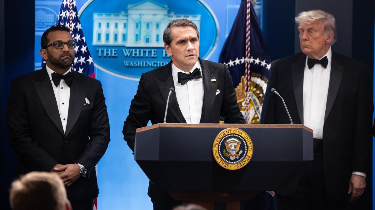 White House. Acting Attorney General Todd Blanche, flanked by FBI Director Kash Patel and President Donald Trump, speaks during a briefing at the White House shortly after a shooting at the White House Correspondents' Dinner at the Washington Hilton in Washington, D.C. on April 25, 2026. (Francis Chung/POLITICO via AP Images)