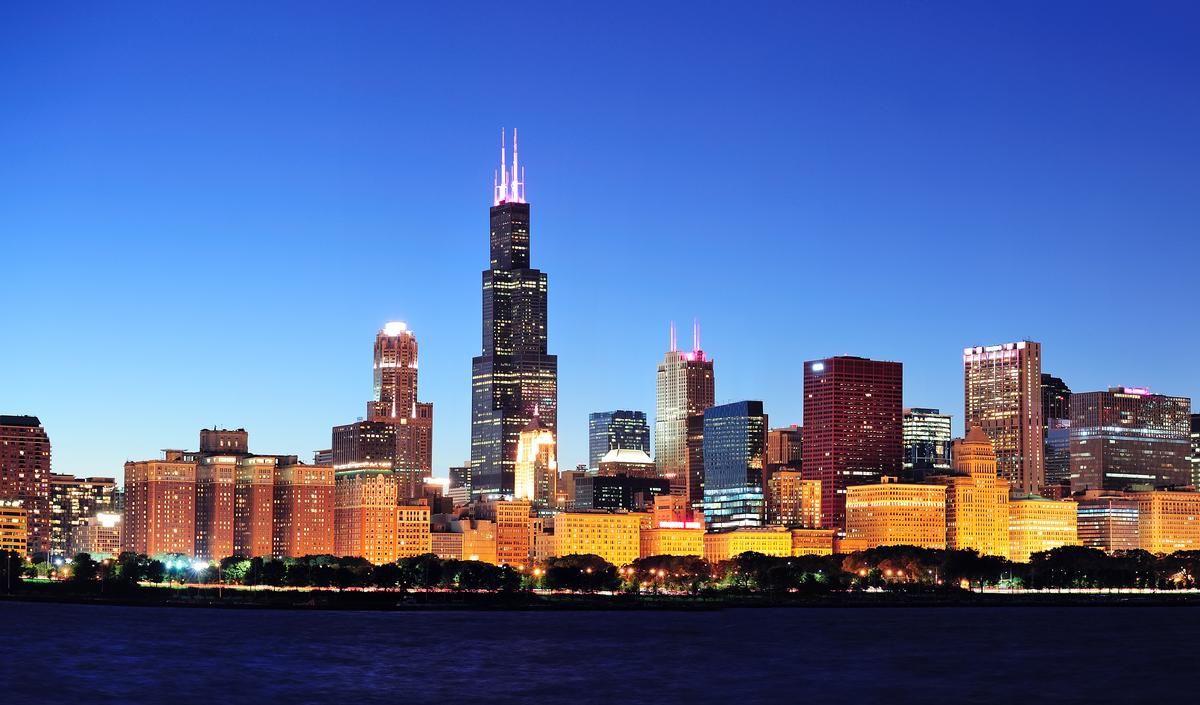  The Chicago city skyline at night, with the Willis Tower at the center. 