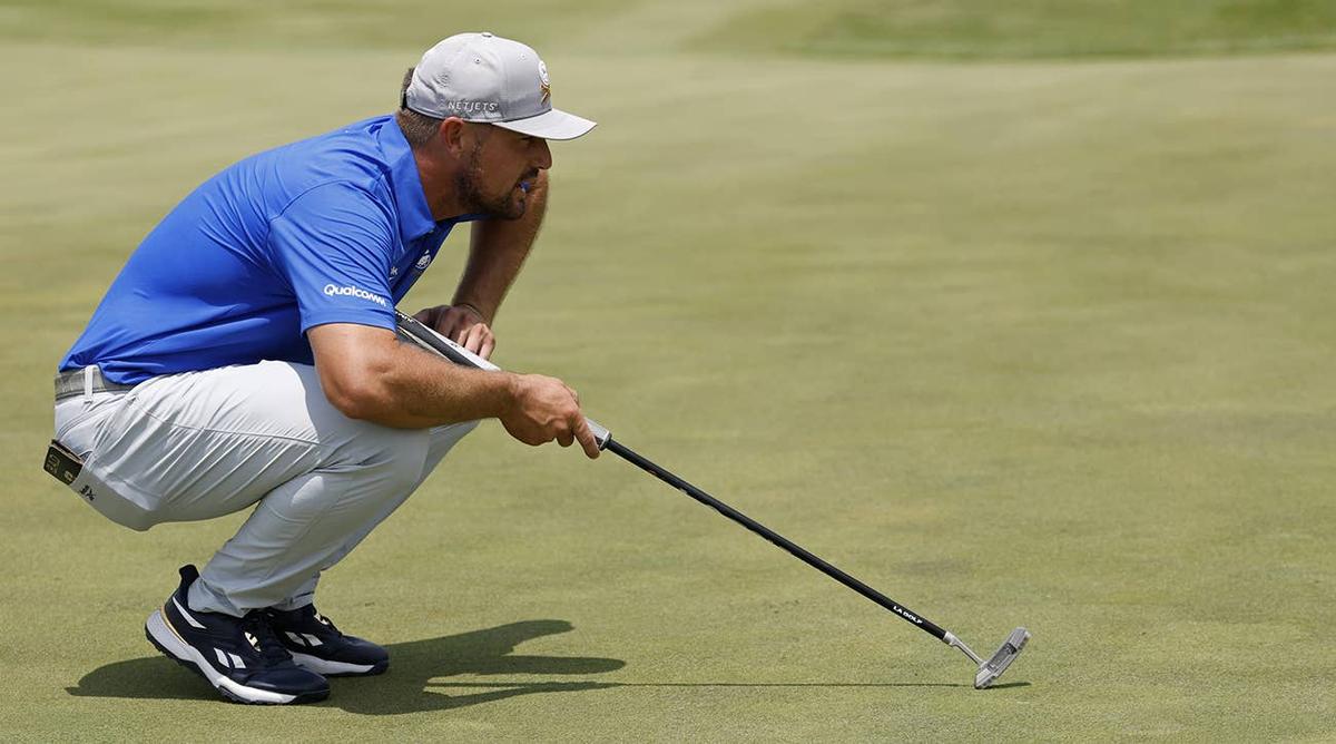  Bryson DeChambeau reads the green on the third hole during the first round of the LIV Golf Virginia tournament at Robert Trent Jones Golf Club in Gainesville, Virginia, on June 6, 2025. Geoff Burke-Imagn Images