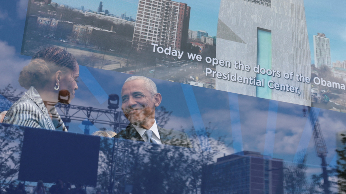 Former U.S. President Barack Obama and his wife, former first lady Michelle Obama attend the dedication ceremony for the opening of the Obama Presidential Centre in Chicago, Illinois, U.S., June 18, 2026. Picture taken through the bulletproof glass. REUTERS/Jonathan Ernst
