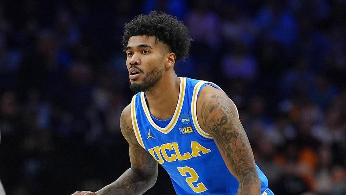  Mar 22, 2026; Philadelphia, PA, USA; UCLA Bruins guard Donovan Dent (2) dribbles the ball against UConn Huskies guard Malachi Smith (0) in the first half during a second round game of the men's 2026 NCAA Tournament at Xfinity Mobile Arena. Mandatory Credit: Kyle Ross-Imagn Images | Kyle Ross-Imagn Images 