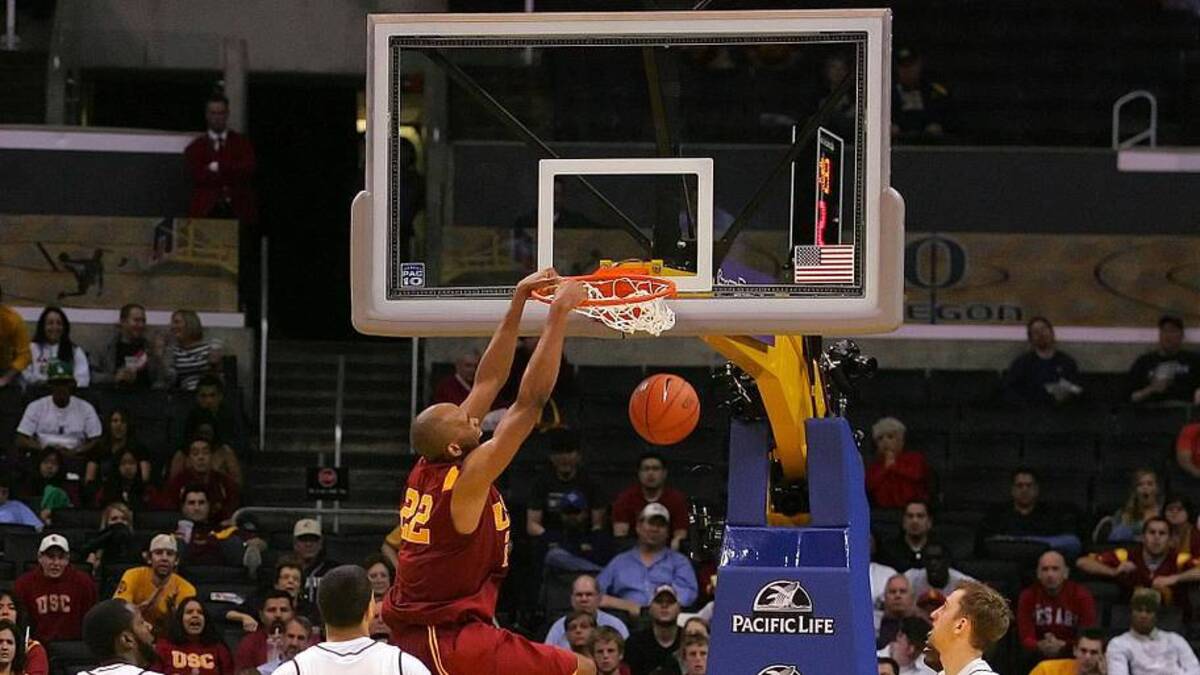  March 14, 2009; Los Angeles, CA, USA; Southern California Trojans forward Taj Gibson (22) dunks to score a basket against the Arizona State Sun Devils during the second half of the championship game of the Pac-10 tournament at Staples Center. Southern California defeats Arizona State 63-66 to win the Pac-10 tournament. Mandatory Credit: Gary A. Vasquez-Imagn Images | Gary A. Vasquez-Imagn Images 