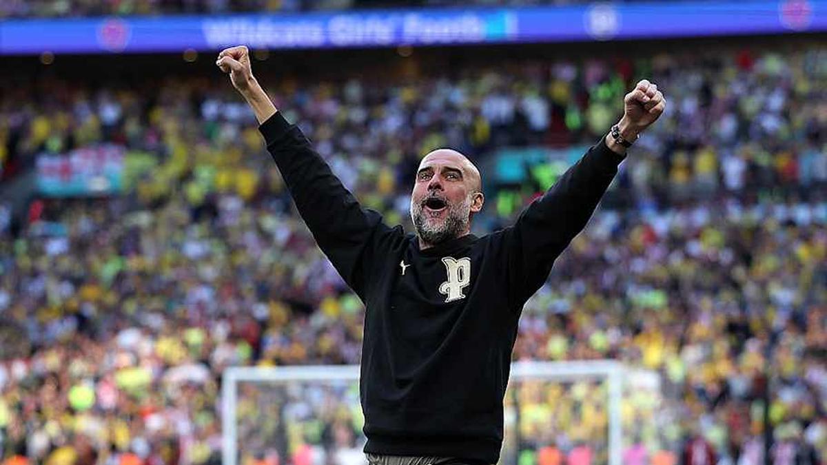  Pep Guardiola has a history of helping Man City win title battles. | Michael Regan/The FA/Getty Images 