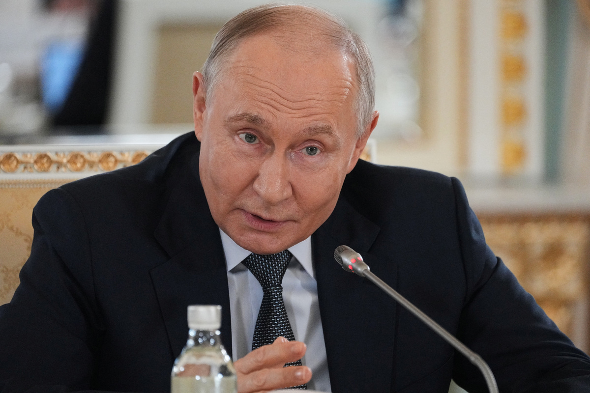 Russian President Vladimir Putin speaks to representatives of international news agencies on the sidelines of the St. Petersburg International Economic Forum, at the Constantine Palace in St. Petersburg, Russia, June 4, 2026.      Dmitri Lovetsky/Pool via REUTERS