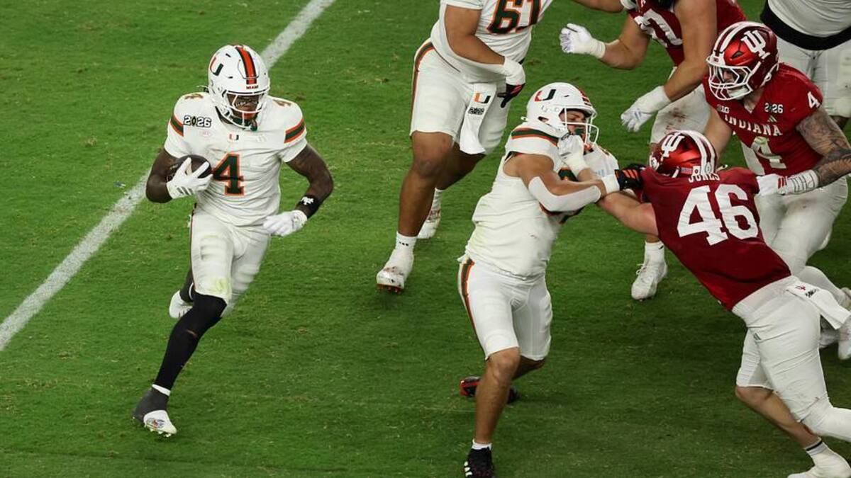  Jan 19, 2026; Miami Gardens, FL, USA; Miami Hurricanes running back Mark Fletcher Jr. (4) carries the ball for a touchdown against the Indiana Hoosiers in the third quarter during the College Football Playoff National Championship game at Hard Rock Stadium. Mandatory Credit: Kim Klement Neitzel-Imagn Images | Kim Klement Neitzel-Imagn Images 