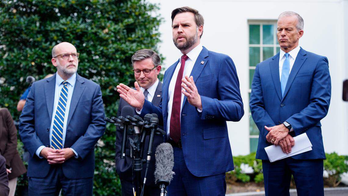 With Office of Management and Budget Director Russell Vought, House Speaker Mike Johnson and Senate Majority Leader John Thune, Vice President JD Vance speaks with the media about the looming government shutdown outside the White House in Washington on Monday.