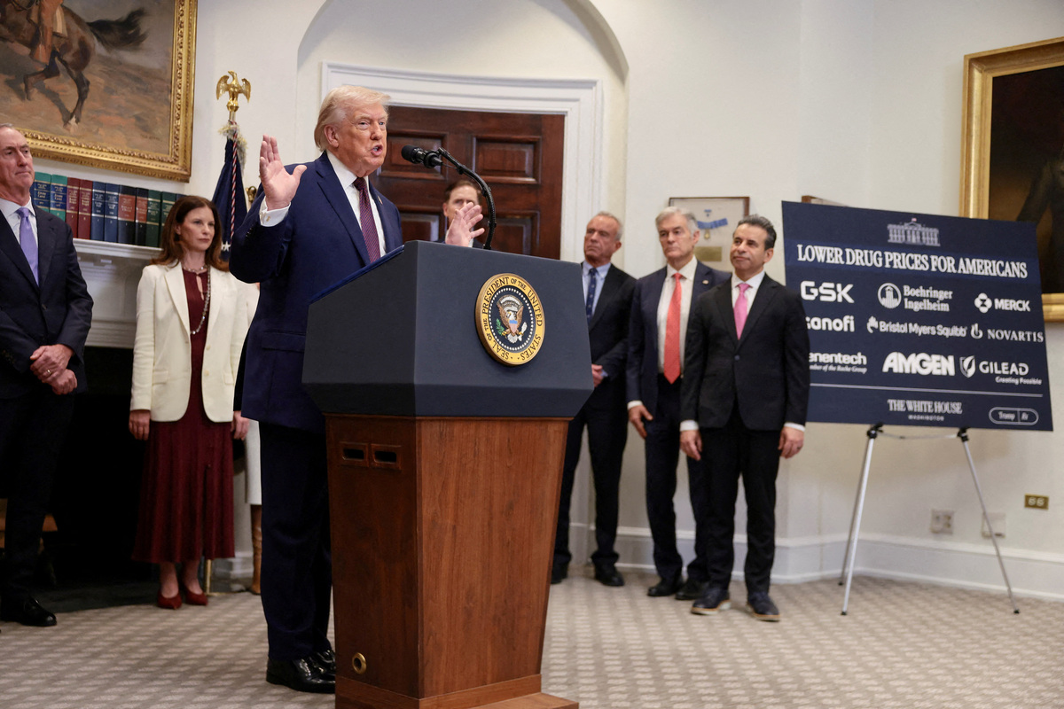 FILE PHOTO: U.S. President Donald Trump gestures as he makes an announcement about lowering the cost of drug prices, at the Roosevelt Room of the White House in Washington, D.C., U.S., December 19, 2025. REUTERS/Evelyn Hockstein/File Photo