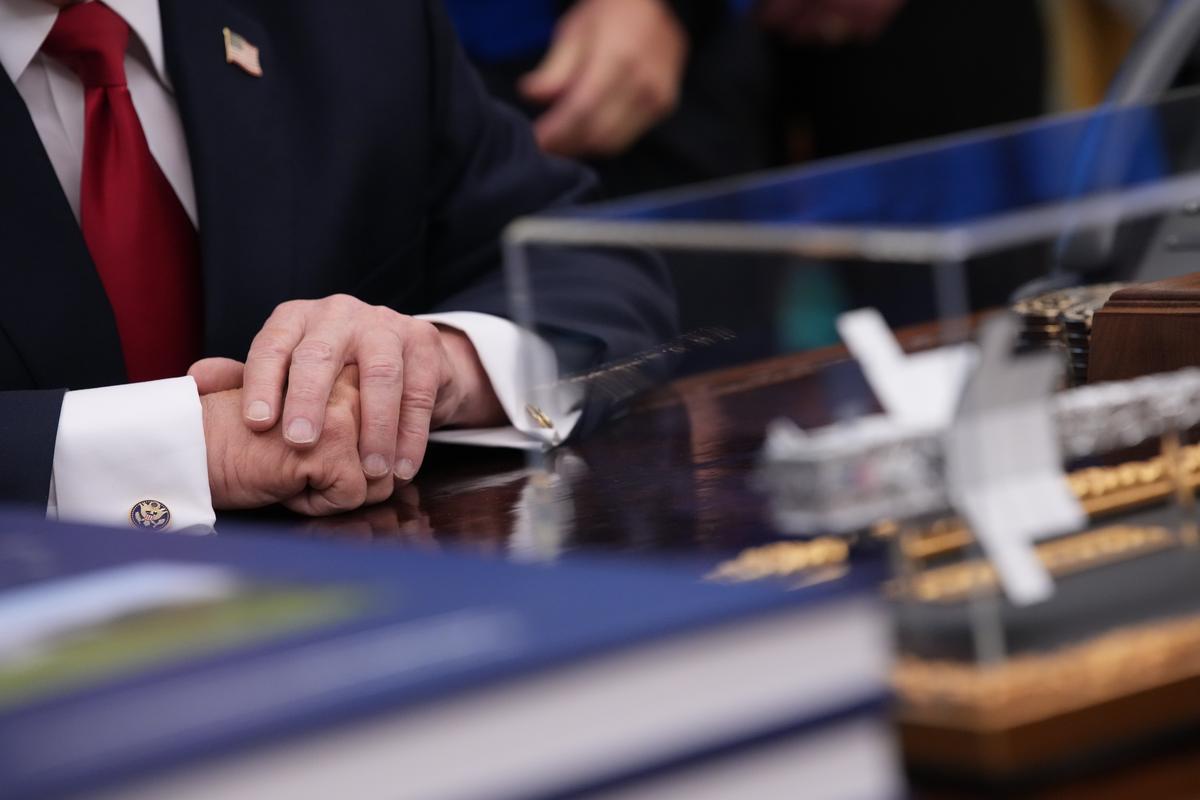  A detailed view of U.S. President Donald Trump’s hands during an event with the Artemis II astronauts in the Oval Office of the White House on April 29, 2026 in Washington, DC. 