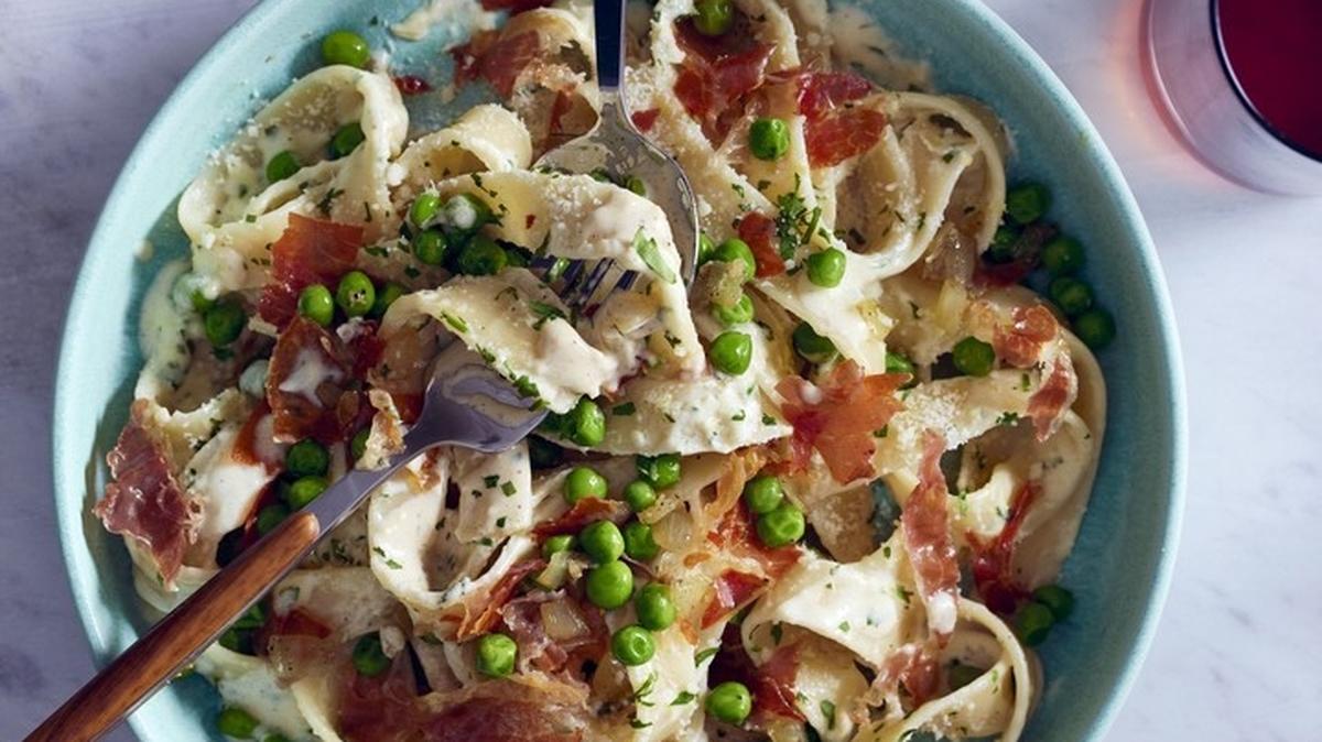 Creamy pappardelle, with prosciutto and peas, feels special-elegant enough for company, yet simple enough for a cozy weeknight dinner.