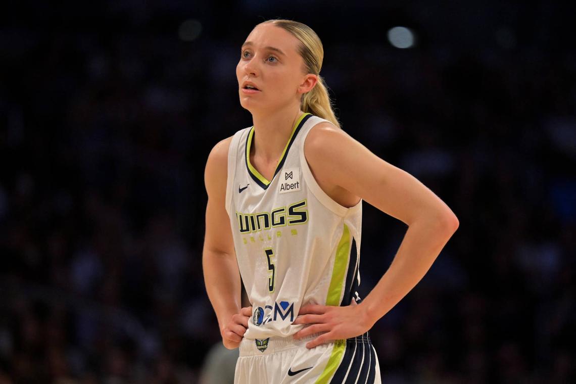  Dallas Wings guard Paige Bueckers (5) looks on during the first half against the Los Angeles Sparks. © Jayne Kamin-Oncea-Imagn Images