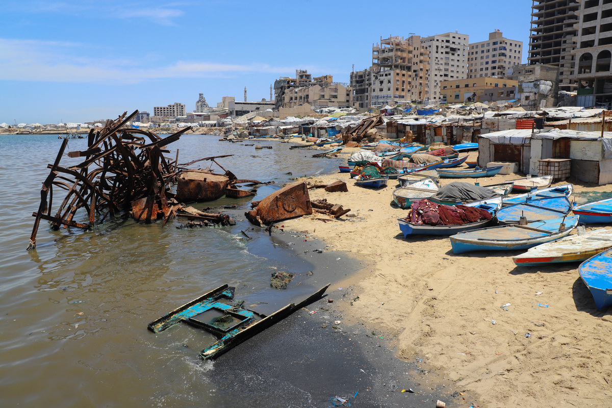 Skiffs used by Palestinian fishermen are docked on the beach in Gaza City, June 3, 2026. REUTERS/Ebrahim Hajjaj