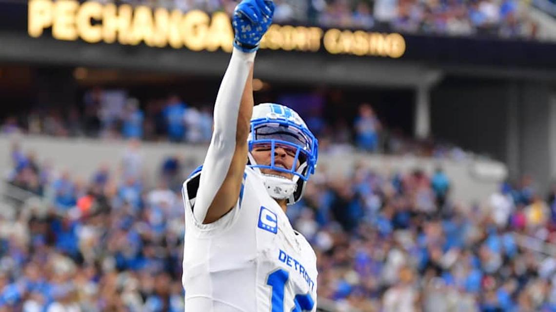  Dec 14, 2025; Inglewood, California, USA; Detroit Lions wide receiver Amon-Ra St. Brown (14) celebrates after a touchdown during the second quarter against the Los Angeles Rams at SoFi Stadium. Mandatory Credit: Gary A. Vasquez-Imagn Images | Gary A. Vasquez-Imagn Images 