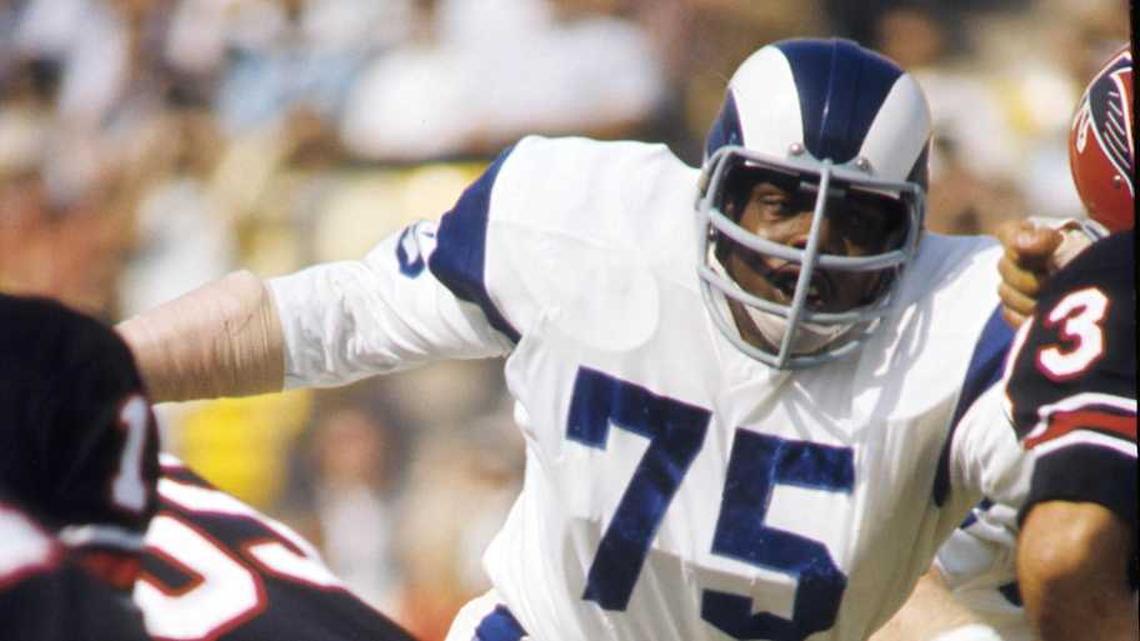  Nov 8, 1970; Los Angeles, CA, USA: FILE PHOTO; Los Angeles Rams defensive tackle Deacon Jones (75) chases Atlanta Falcons quarterback Bob Berry (17) at the Los Angeles Memorial Coliseum. Mandatory Credit: Long Photography-Imagn Images | Long Photography-Imagn Images 
