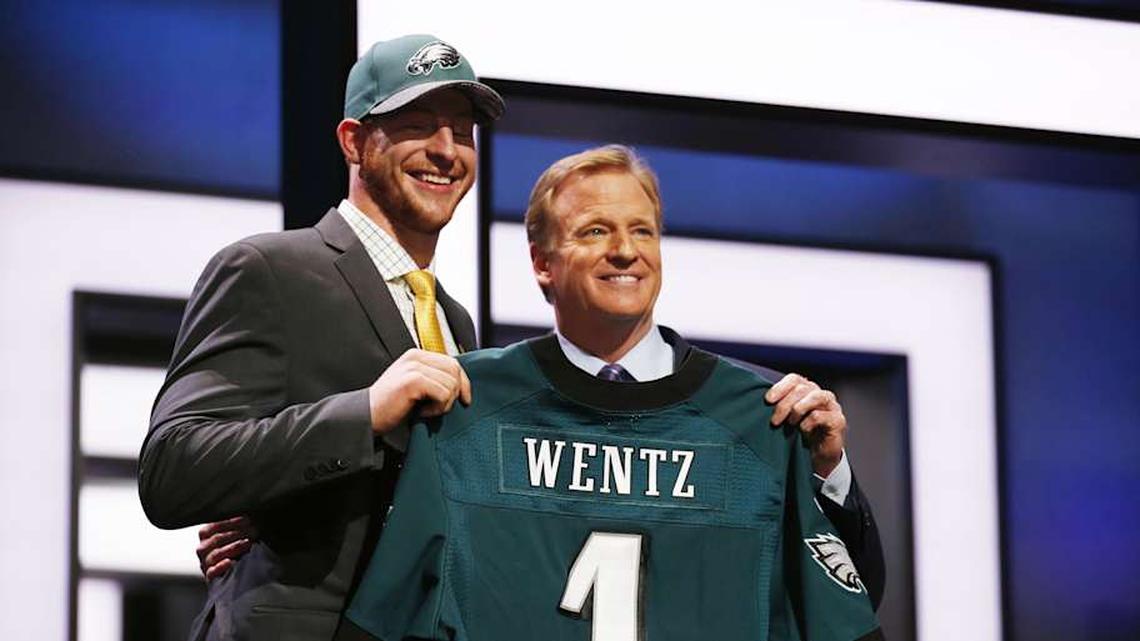  Apr 28, 2016; Chicago, IL, USA; Carson Wentz (North Dakota State) with NFL commissioner Roger Goodell after being selected by the Philadelphia Eagles as the number one overall pick in the first round of the 2016 NFL Draft at Auditorium Theatre. Mandatory Credit: Kamil Krzaczynski-Imagn Images | Kamil Krzaczynski-Imagn Images 