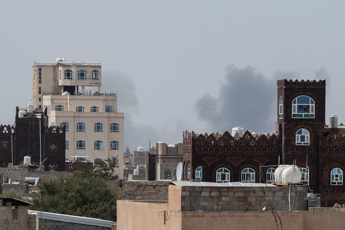 Smoke rises after reports of an airstrike hitting near the Sanaa International Airport, as seen from Sanaa, Yemen, July 13, 2026. REUTERS/Khaled Abdullah